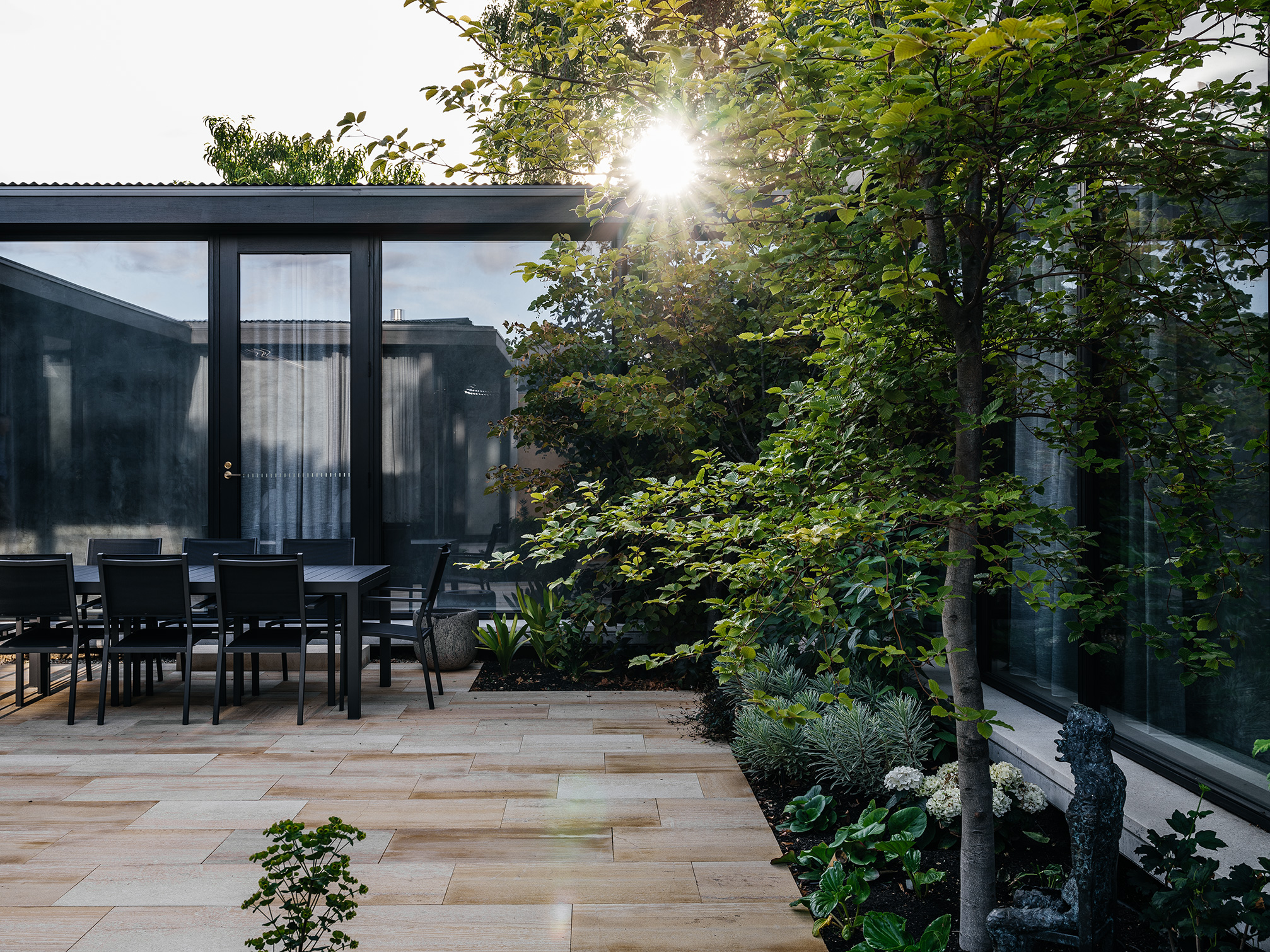 cocktails at dusk in paved courtyard