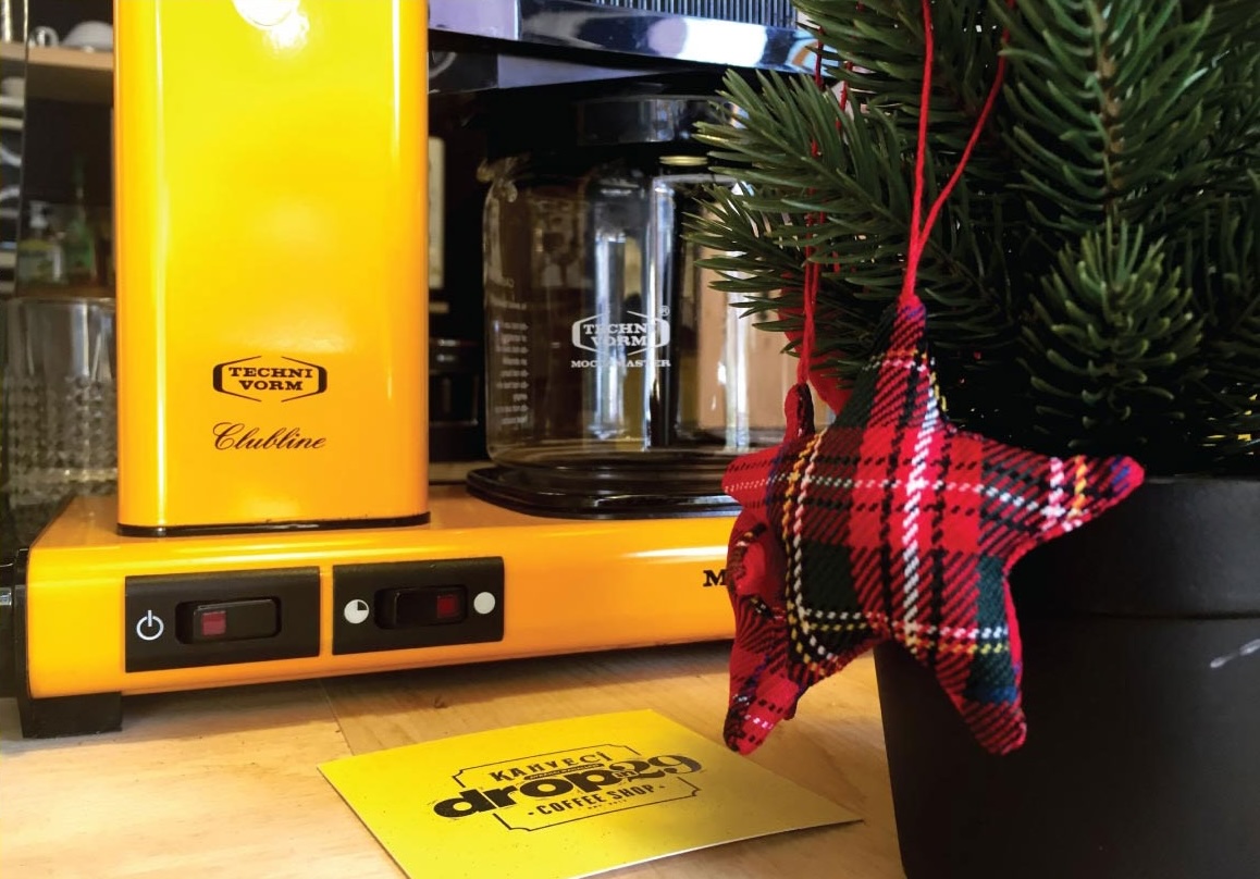 Photo of the espresso machine on the counter — placeholder, replace with Figma export