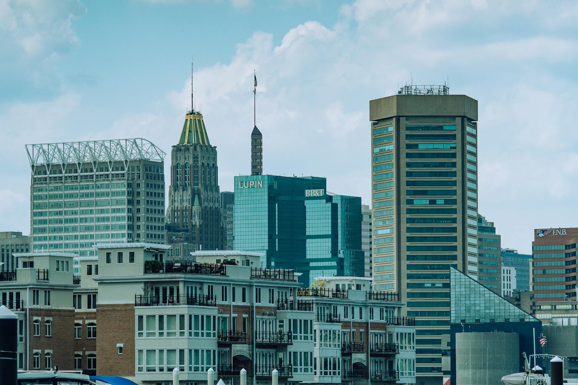 A vibrant view of Baltimore cityscape featuring iconic skyscrapers under a clear sky.