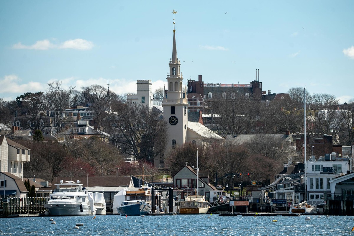 Explore Newport Harbor's waterfront featuring historic architecture and a scenic skyline.