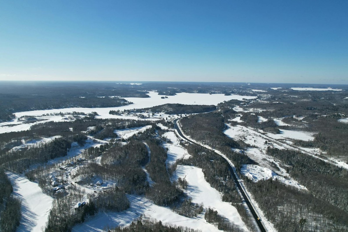 Breathtaking aerial view of snowy winter landscape in Huntsville, Ontario, Canada.