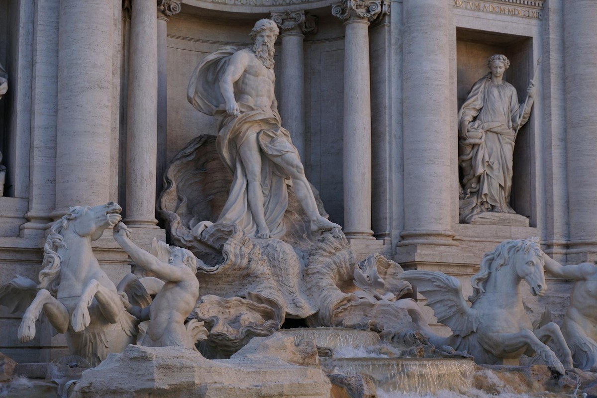 Capture of the iconic Trevi Fountain showcasing its stunning baroque sculptures in Rome, Italy.