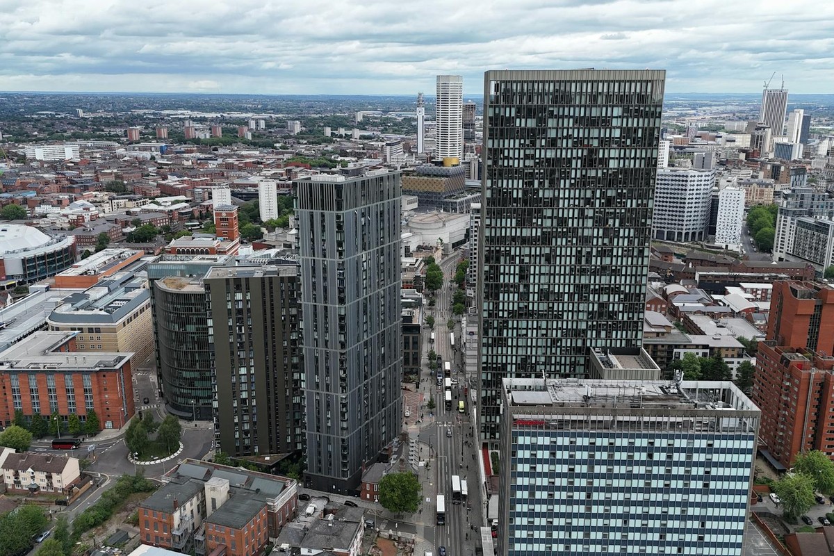 Aerial view of modern skyscrapers in Birmingham, England showcasing urban architecture and cityscape.
