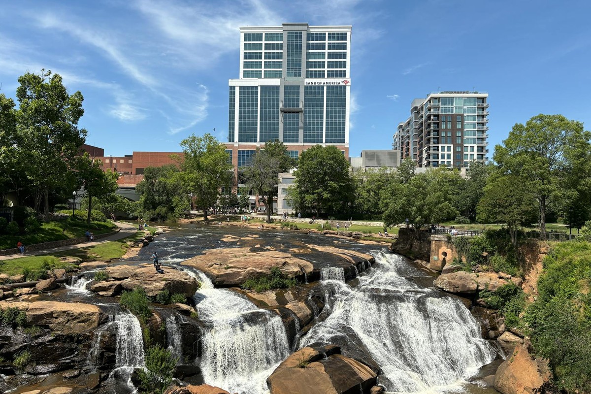View of downtown Greenville with Reedy River Falls, a unique blend of nature and urban landscape.