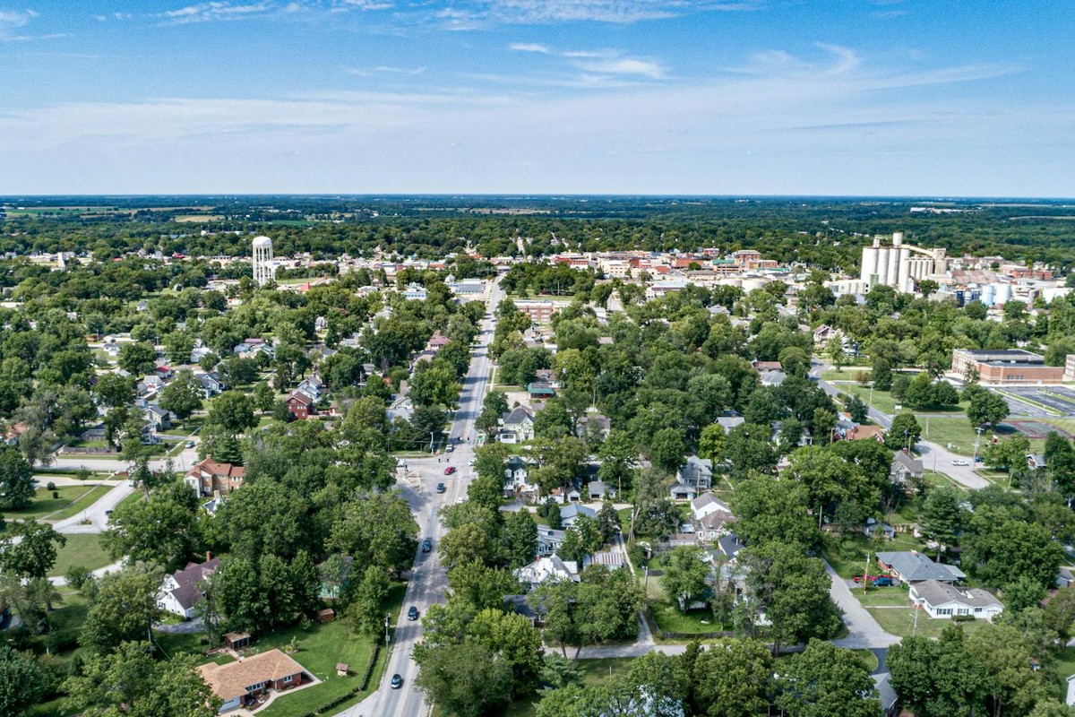 Explore the scenic suburban landscape of Mexico, Missouri from an aerial perspective.