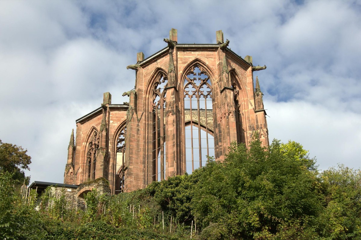 Historic ruins of Werner Chapel, showcasing Gothic architecture against a bright sky in Bacharach, Germany.
