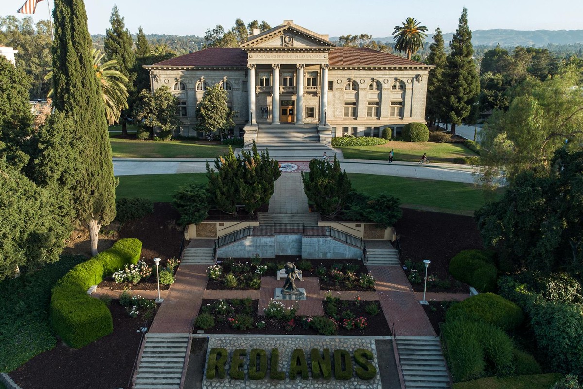 Aerial view of the University of Redlands campus with lush gardens and historic architecture.
