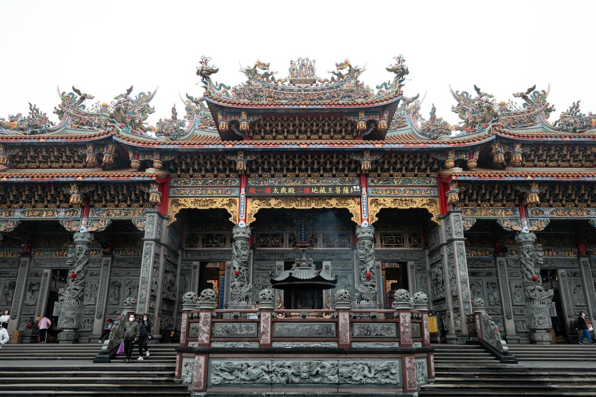 Intricate architecture of Zushi Temple in New Taipei City, Taiwan, showcasing traditional craftsmanship.