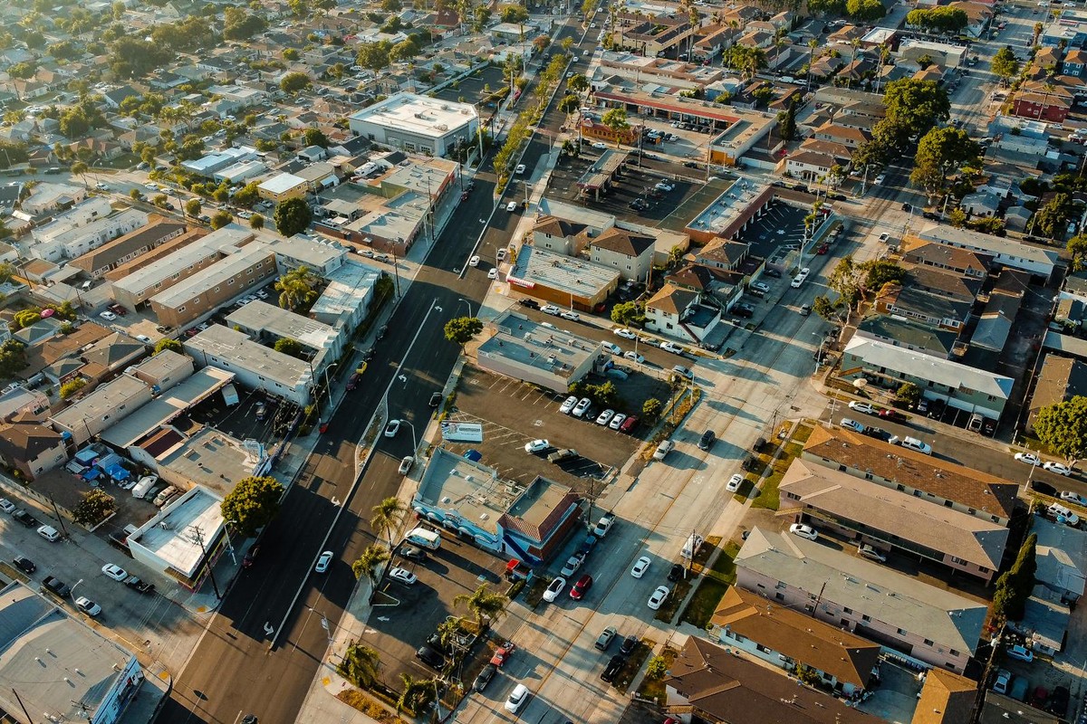 Aerial view of Lynwood, CA showcasing urban landscape and streets during the day.