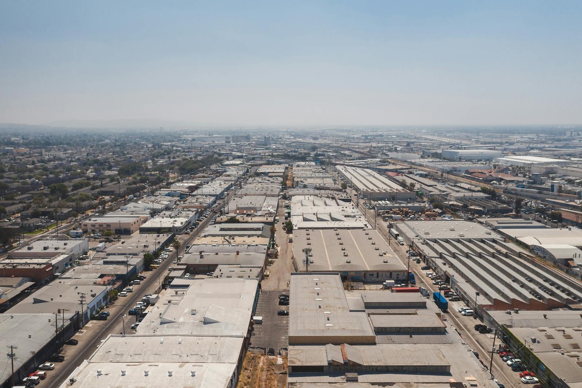 Aerial view of industrial buildings in Los Angeles, showcasing urban development and infrastructure.