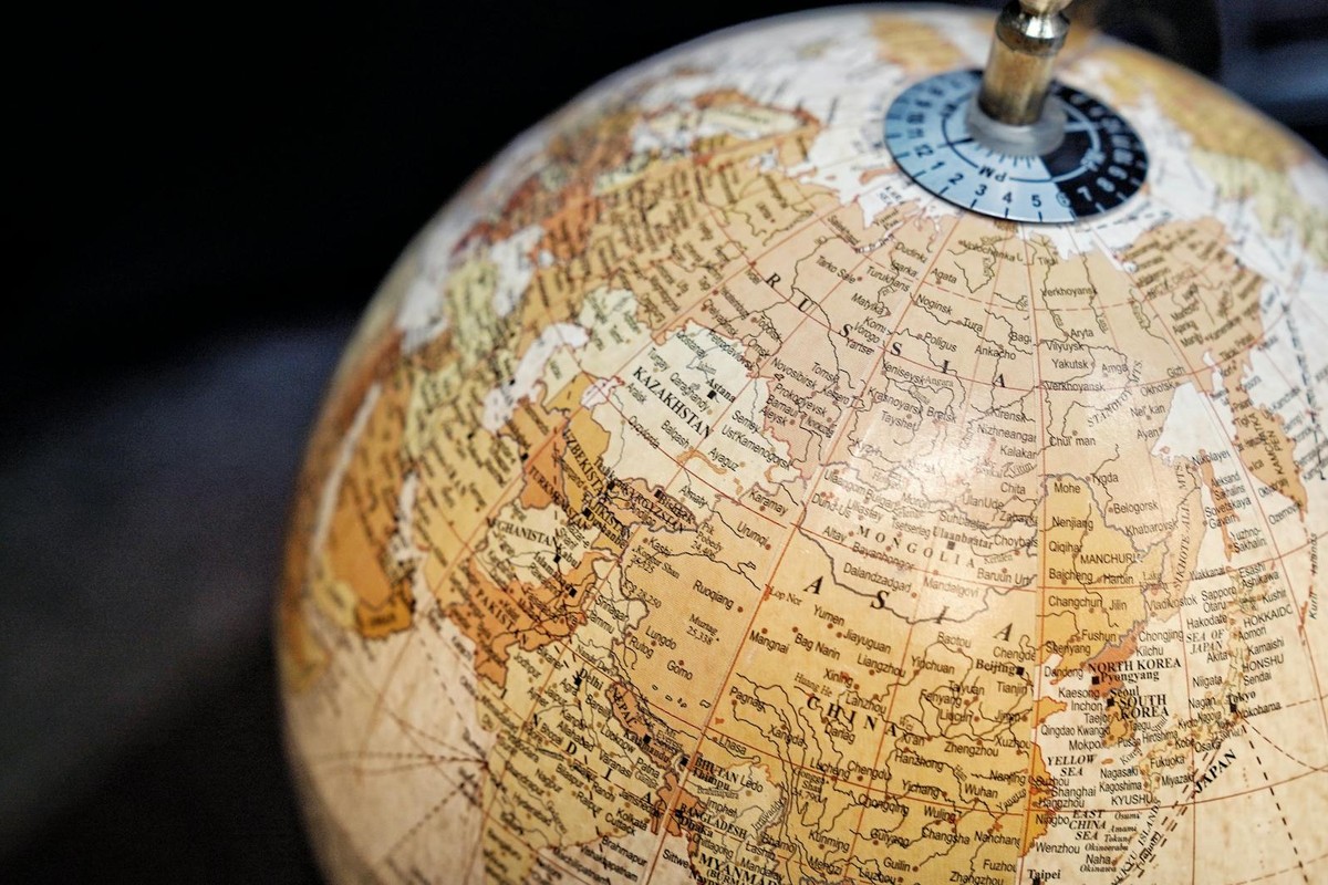 Close-up of a vintage style globe with a focus on Asia and surrounding regions.