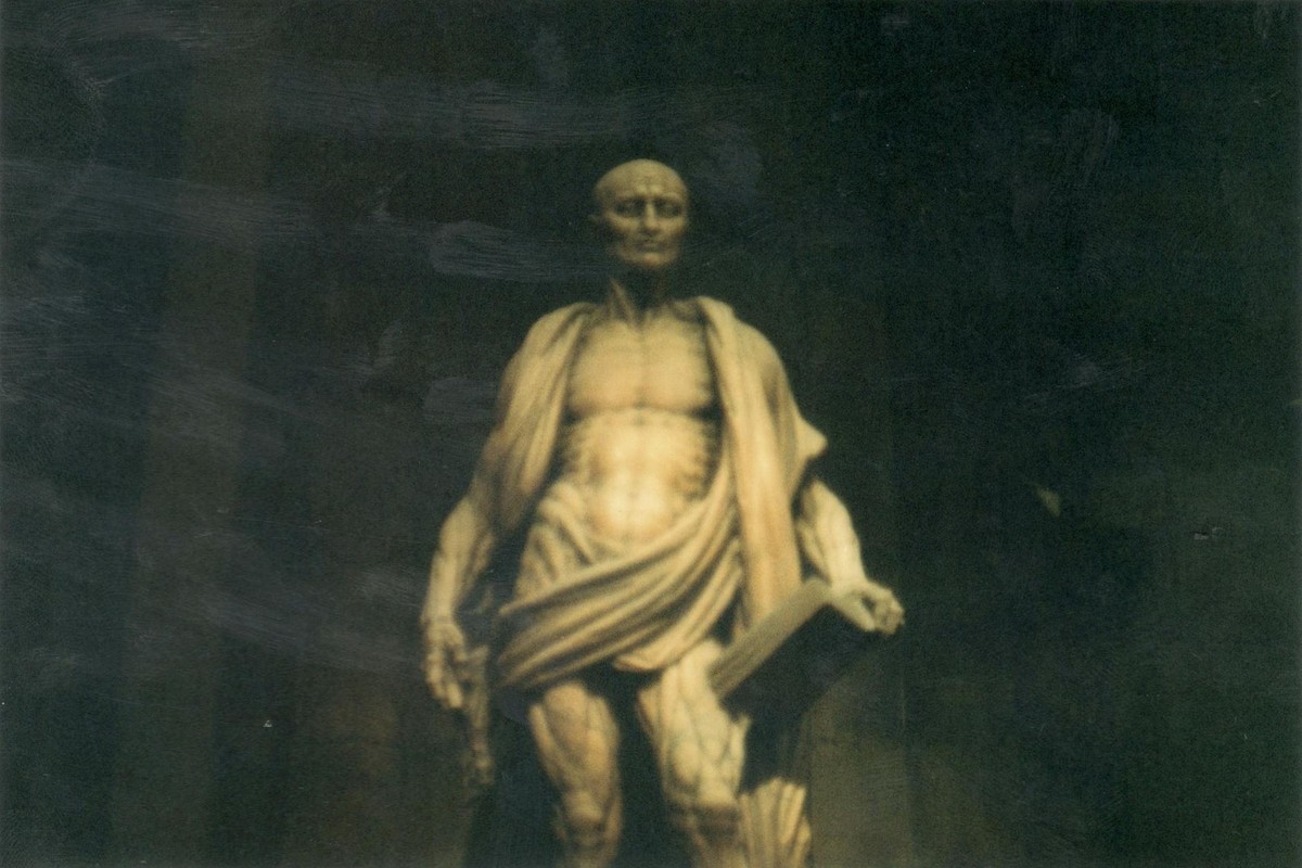 Blurred image of Saint Bartholomew Flayed statue in Milan Cathedral, Italy.