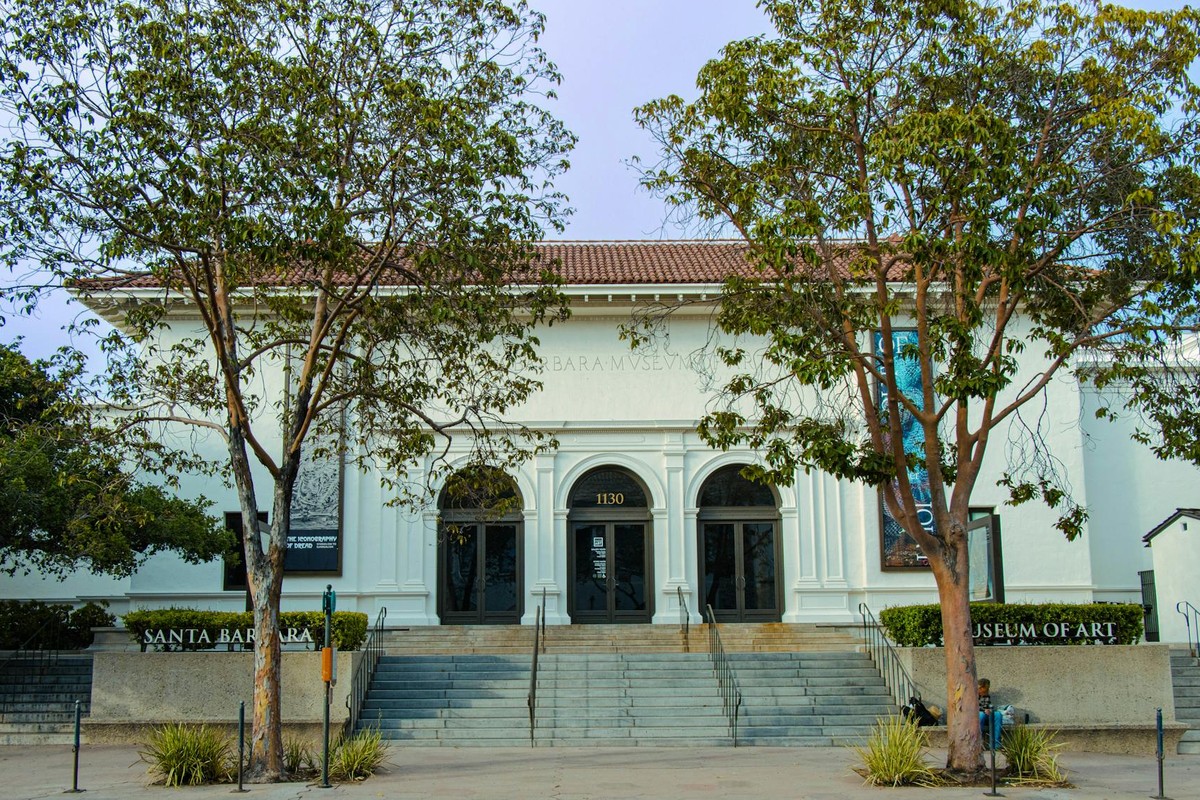 Front view of Santa Barbara Museum of Art with trees framing the entrance.
