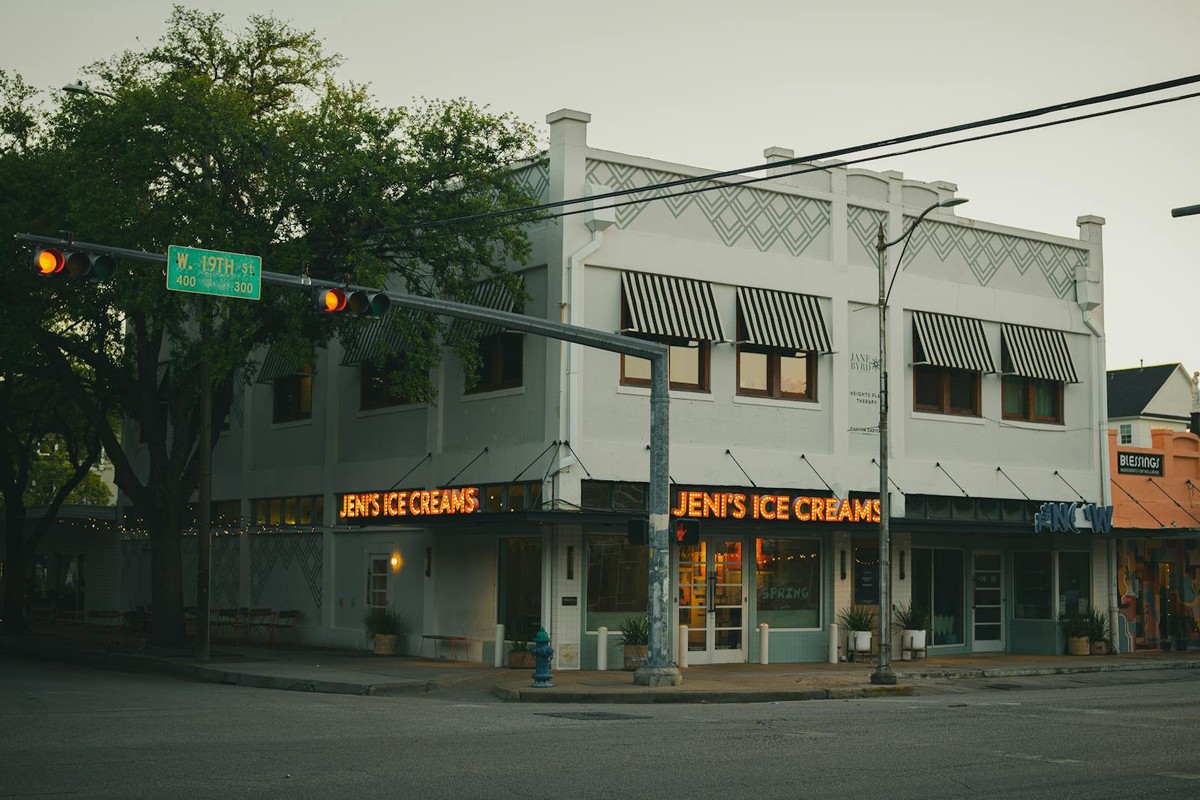 A classic ice cream shop with neon lights under evening sky in Houston, Texas.