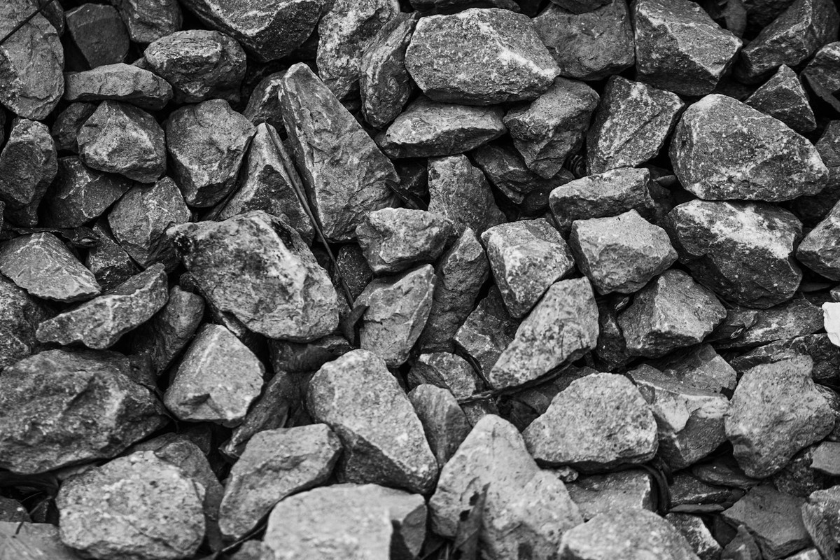 Black and white photo of textured rocks creating a natural pattern in Midland, ON.