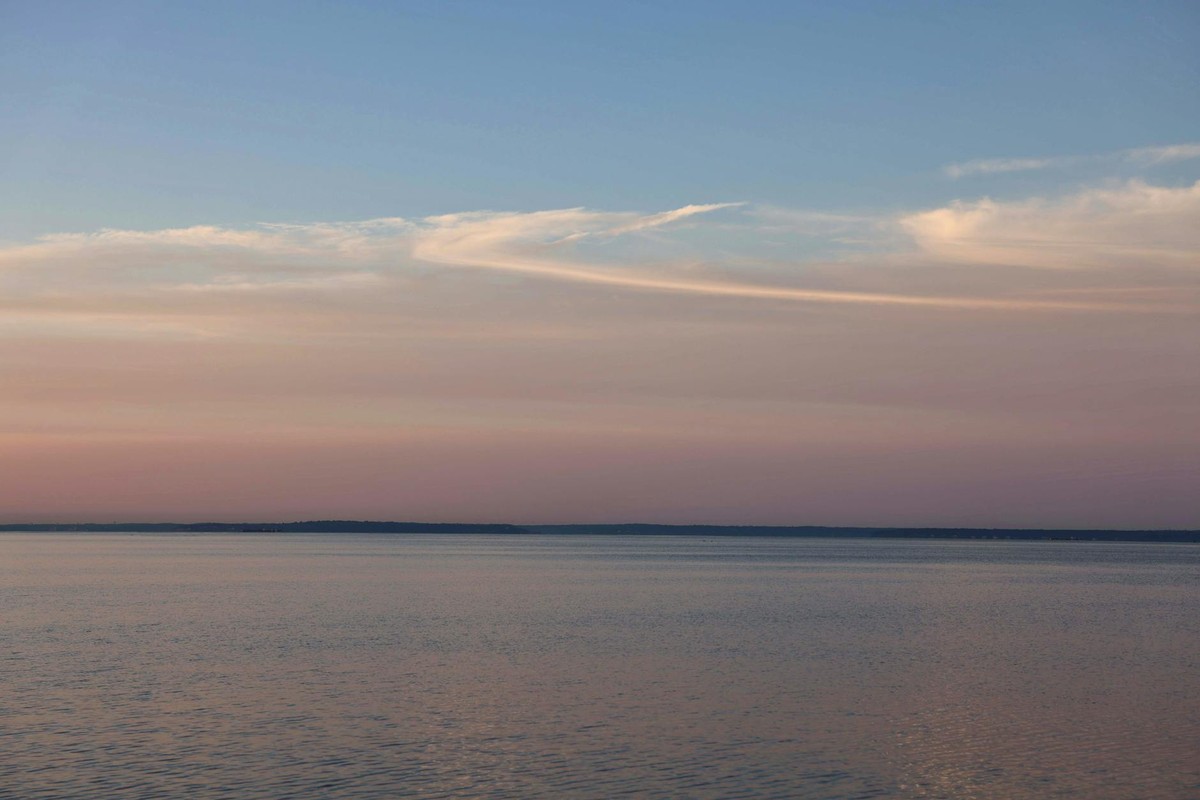 Peaceful sunrise over the calm waters of Stamford Sound, Connecticut.