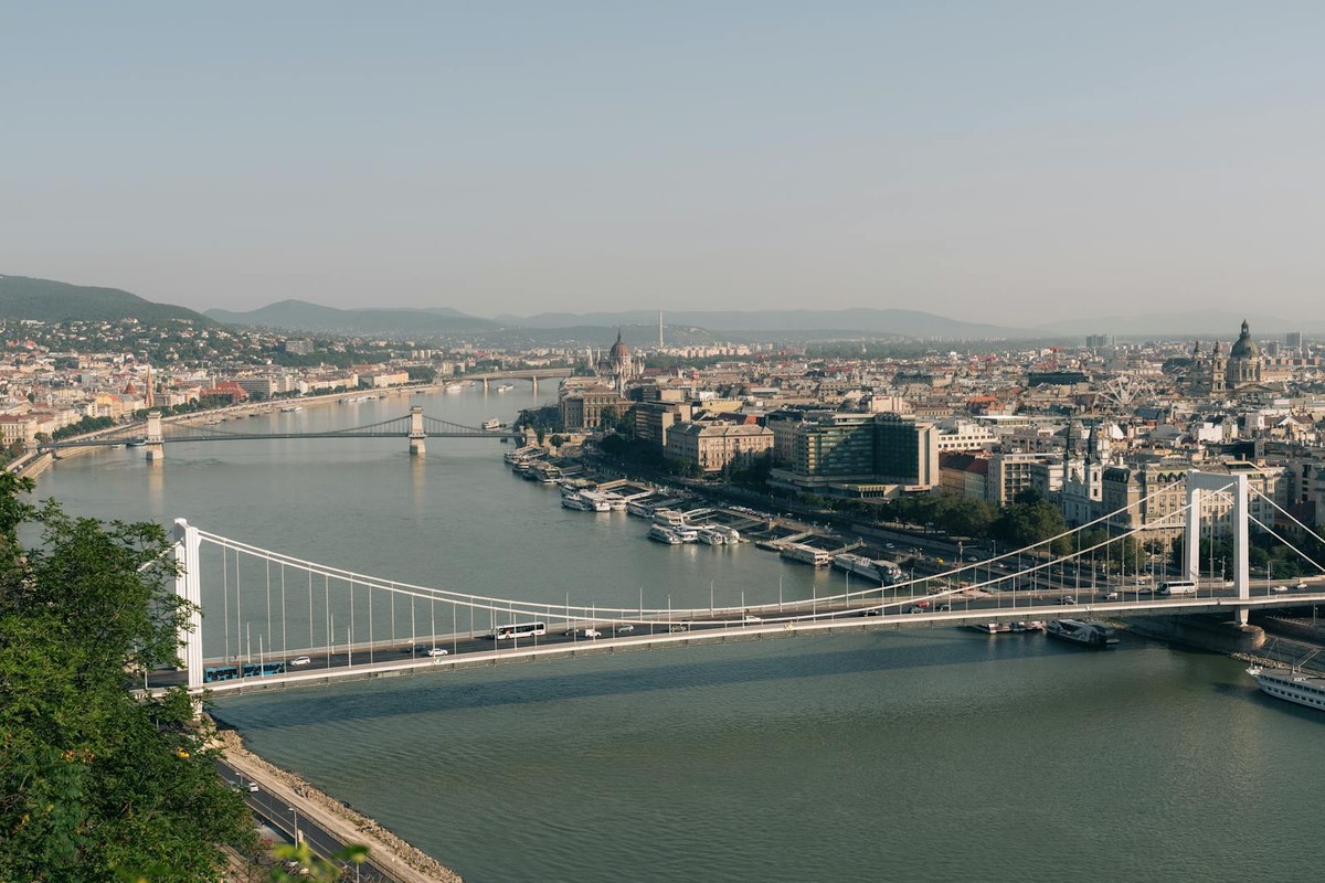 Aerial view of Budapest with its iconic Chain Bridges over the Danube River.