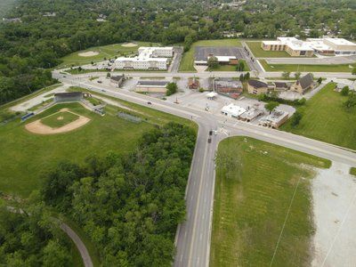 Aerial view of a road intersection, baseball field, and buildings in Chicago Heights, Illinois.