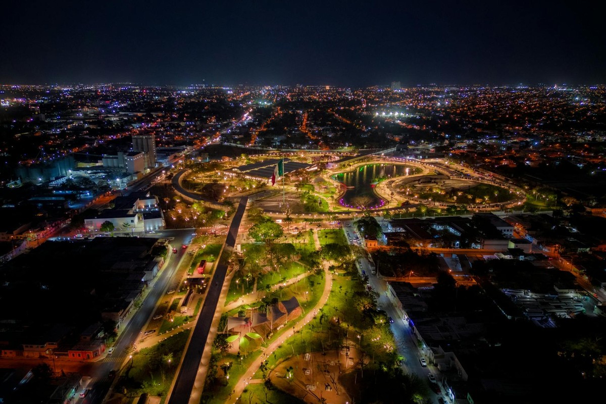 Stunning aerial view of Mérida, México at night, showcasing vibrant city lights.