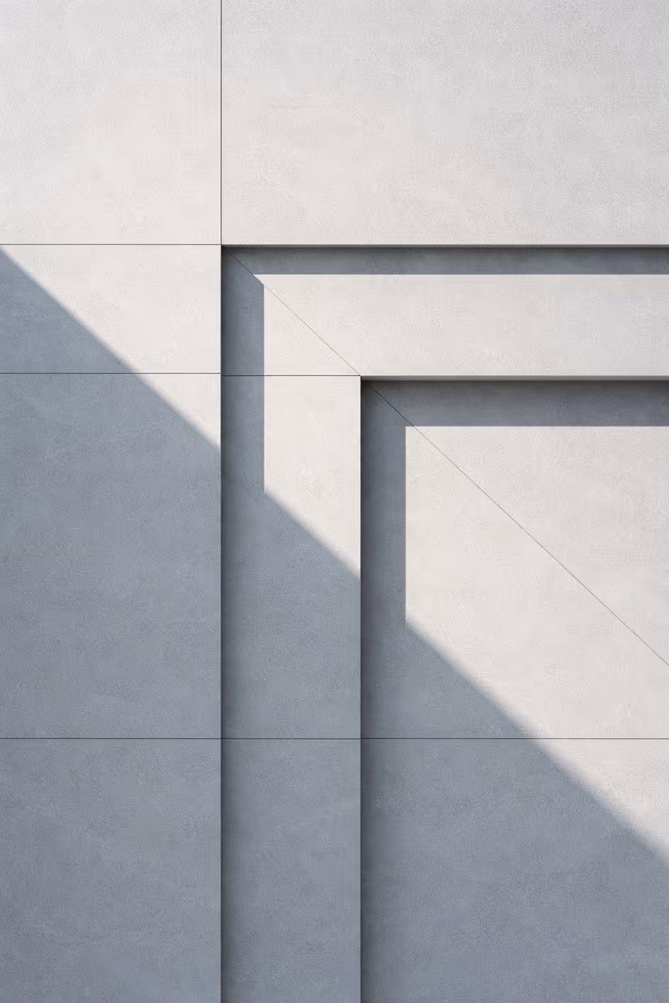 A minimalist architectural detail of light and shadow on stone panels, symbolizing focused support, depth of focus, and practical operating judgment.