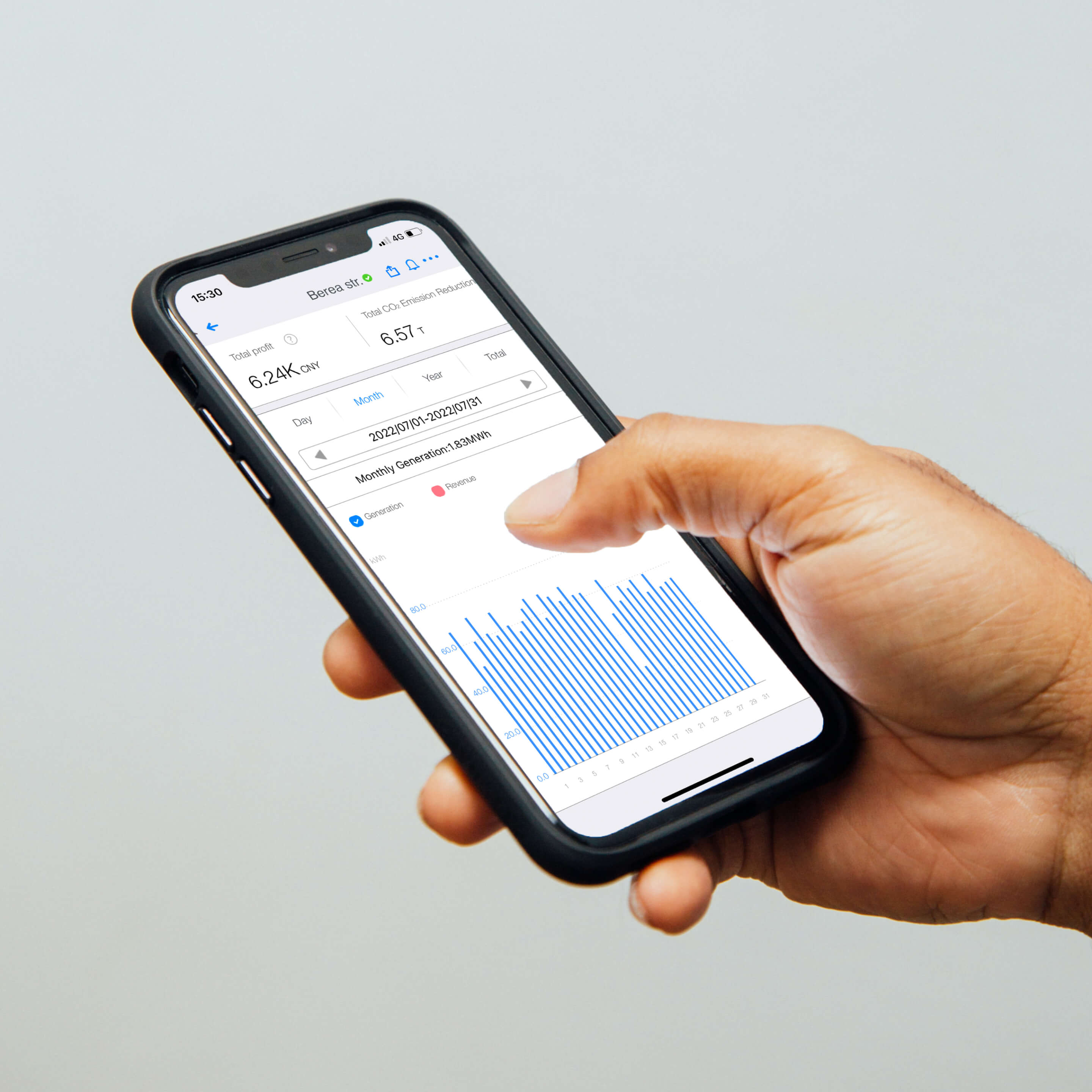 Photo capturing a person holding a phone and engaging with the Solarman (legacy) app during a rapid usability test for a UX audit.