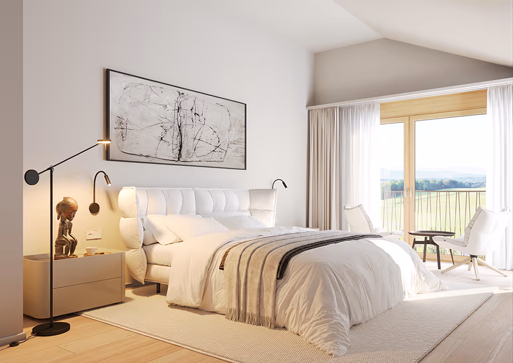 Bright modern bedroom with white upholstered bed, light wood flooring, abstract artwork above the bed, and large windows showing a green landscape.