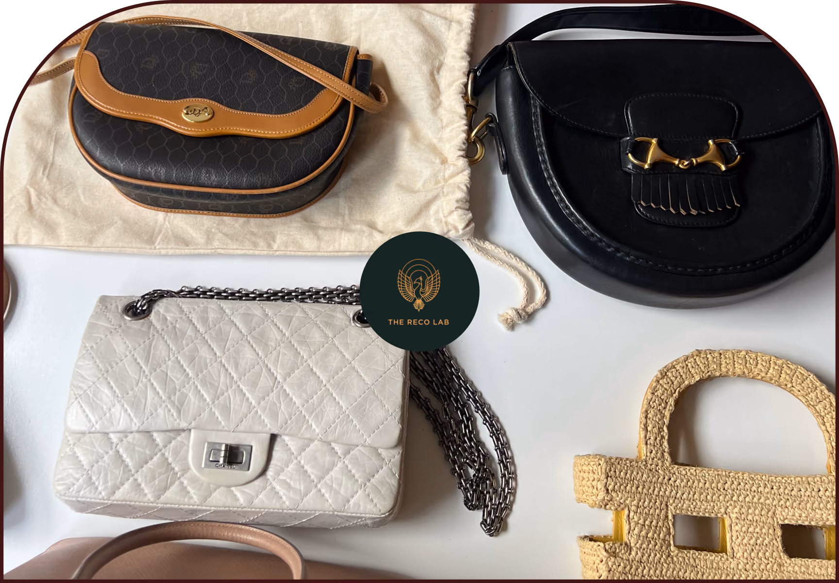 Collection of designer handbags including Chanel, Gucci and a woven raffia bag awaiting restoration at The Reco Lab