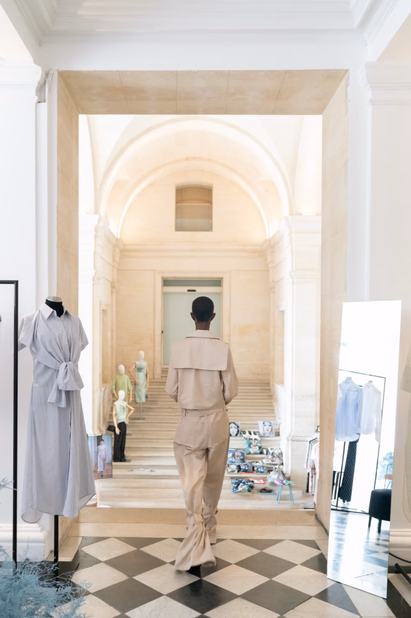 Melagence showroom interior with fashion brand displays
