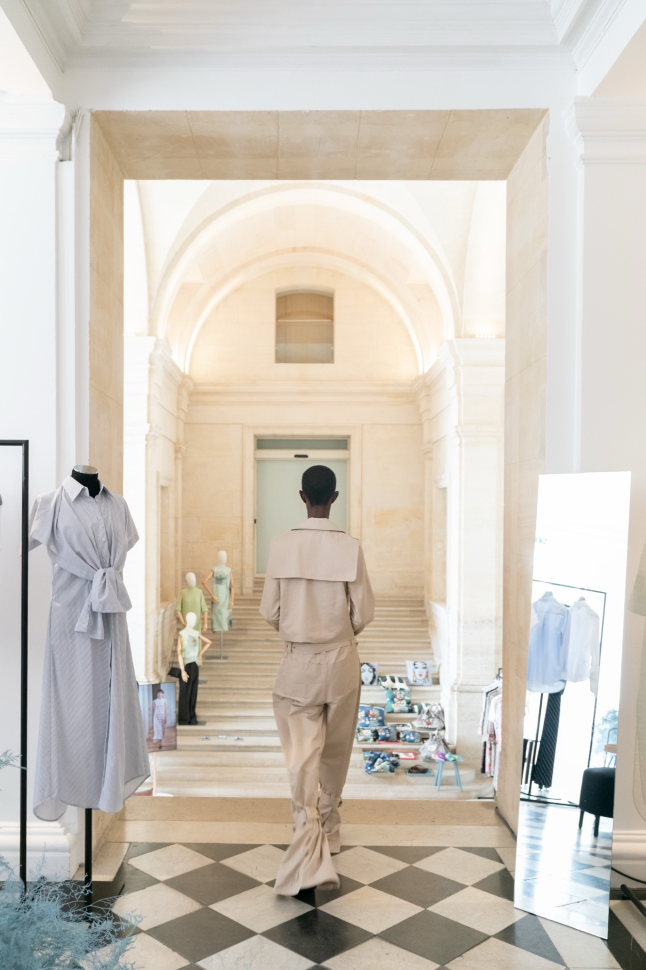 Melagence showroom interior with fashion brand displays