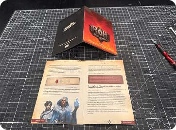 Here is the prototype instruction manual laid out on the table before assembly.
