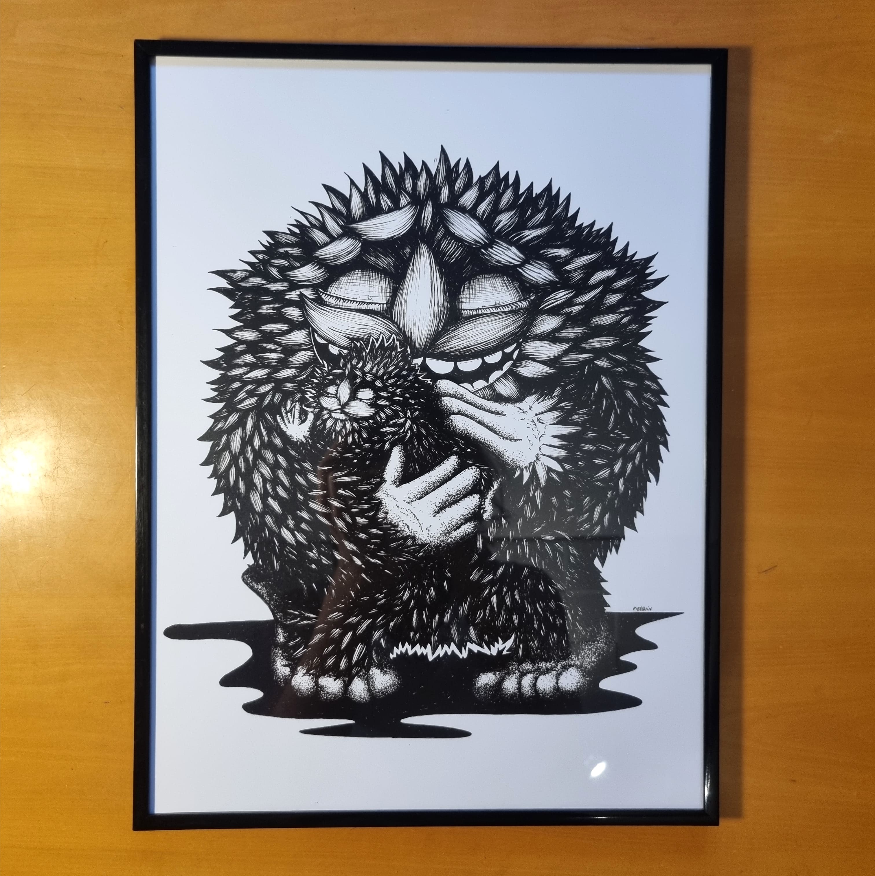 Black and Furry Monster giving a hug to her cute baby monster