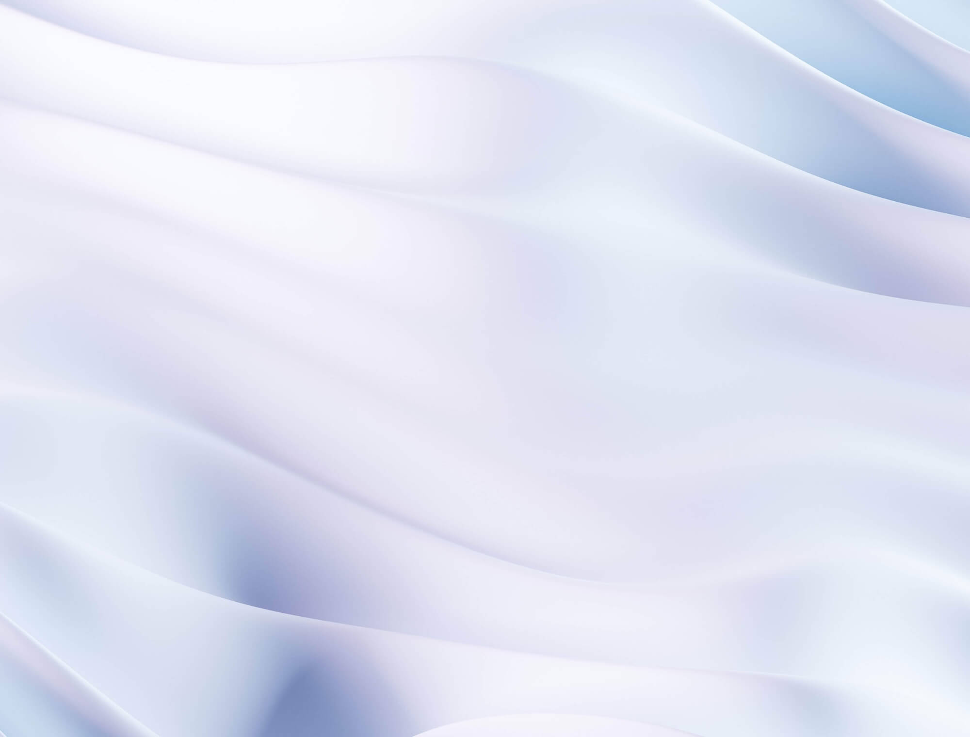 Soft, flowing white fabric with smooth folds and a slight blue tint.