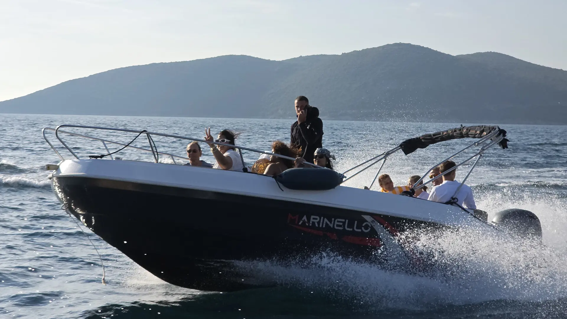 Speedboats docked at Our Lady of the Rocks island near Perast in Kotor Bay Montenegro