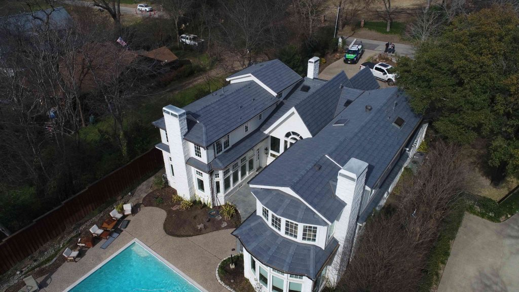 Residential roofing project with a swimming pool