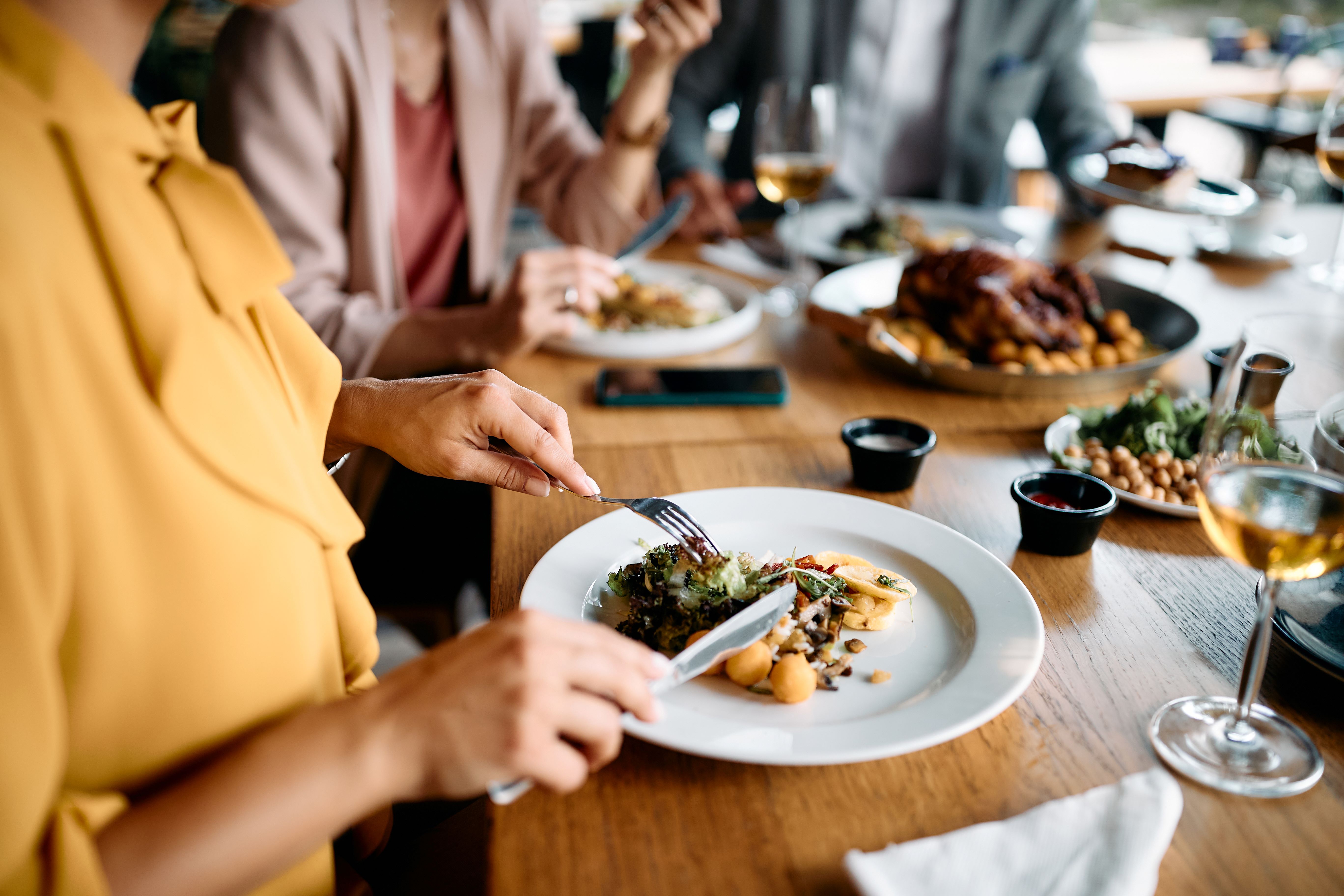 People dining at a restaurant table 