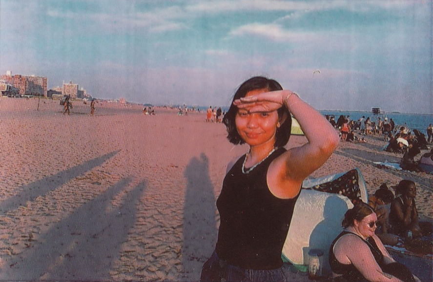 Photo of me by Maria Carrasco. The image depicts an Asian woman with a bob on a beach.