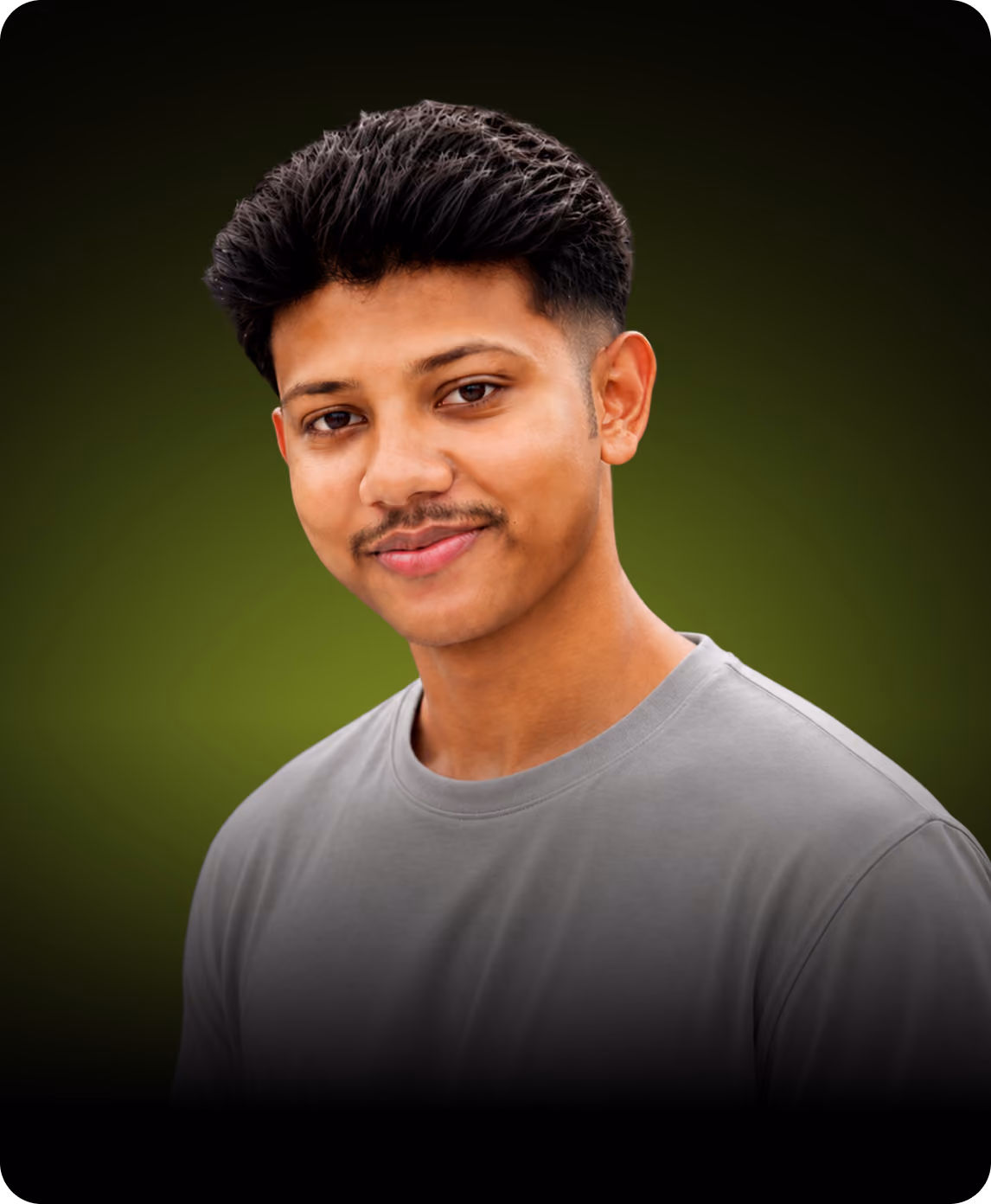 Portrait of a young man with short dark hair and a mustache wearing a gray shirt against green background.