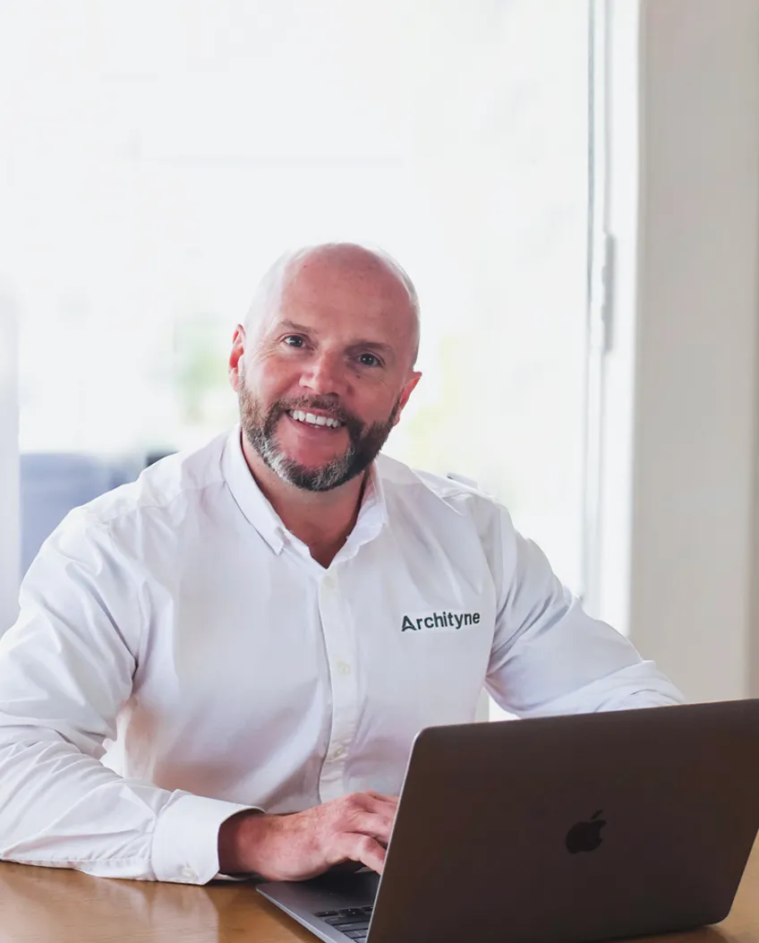 Archityne founder Chris Willits on a building project