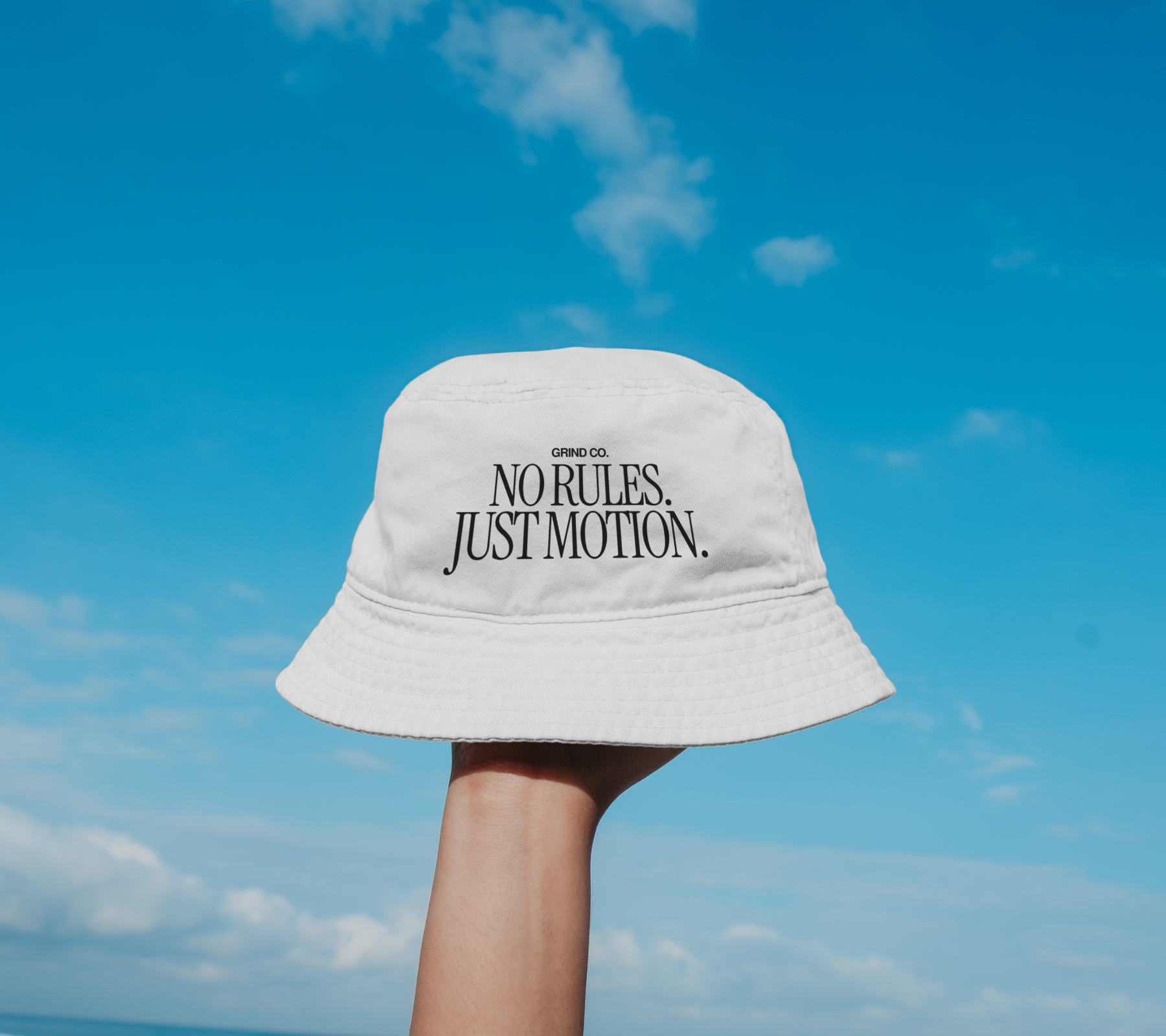 A had with the logo and tagline of Grind Co.