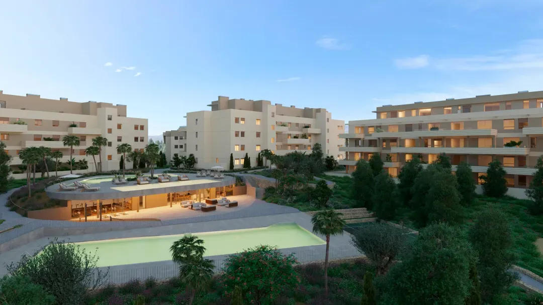 Greenity – budynki osiedla i basen wśród zieleni o zmierzchu