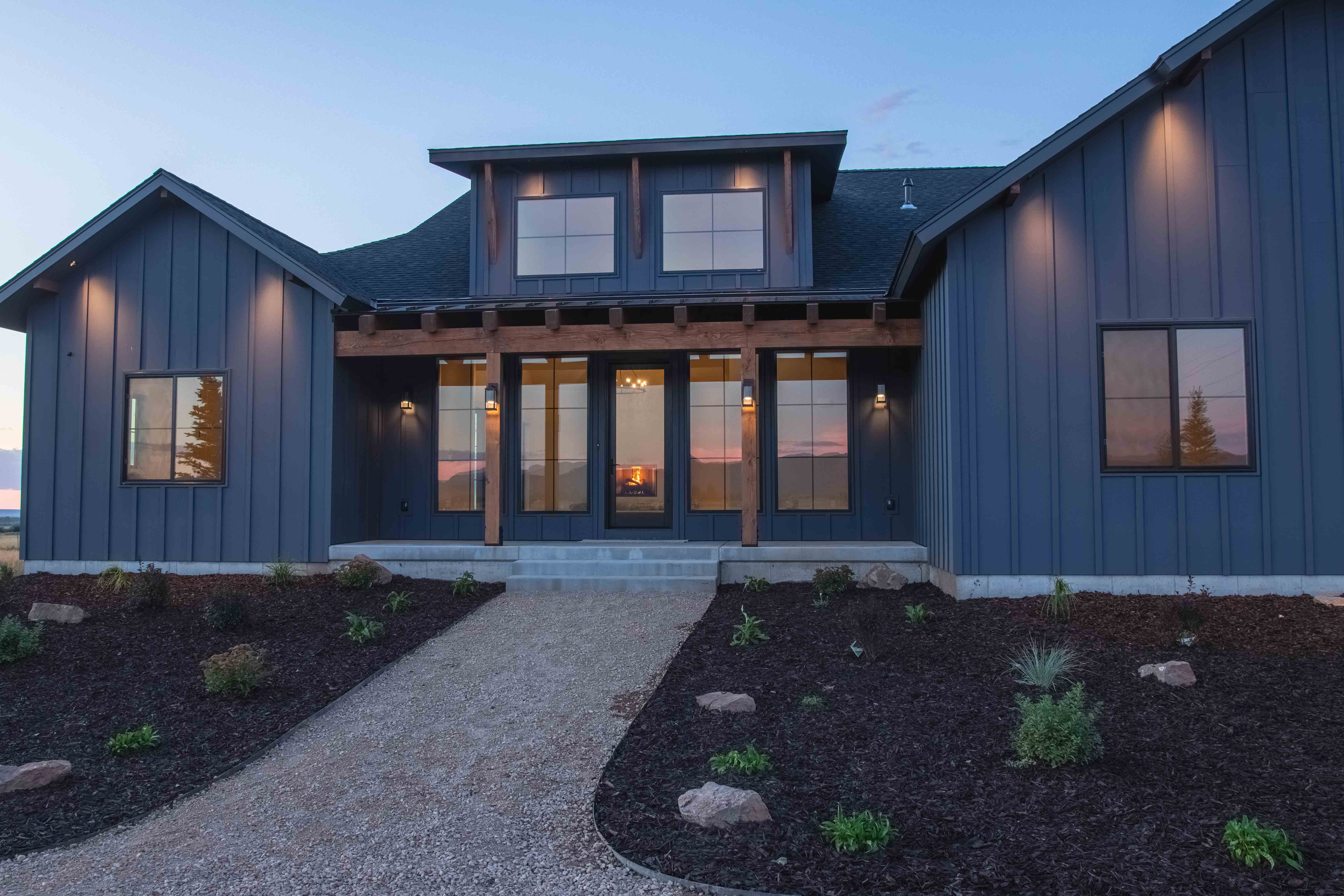 Front of home. Dusk.
