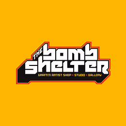 The Bomb Shelter graffiti artist shop, studio, and gallery logo on yellow background.