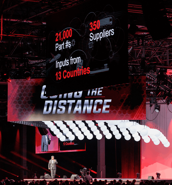 A large-scale stage and visual design for Bryant NDC, creating an immersive, high-energy experience through bold graphics and dynamic LED content.