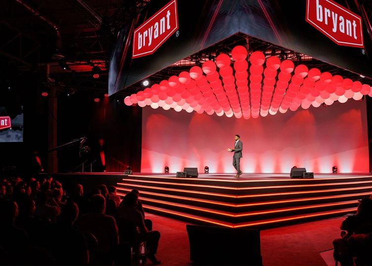 A large-scale stage and visual design for Bryant NDC, creating an immersive, high-energy experience through bold graphics and dynamic LED content.