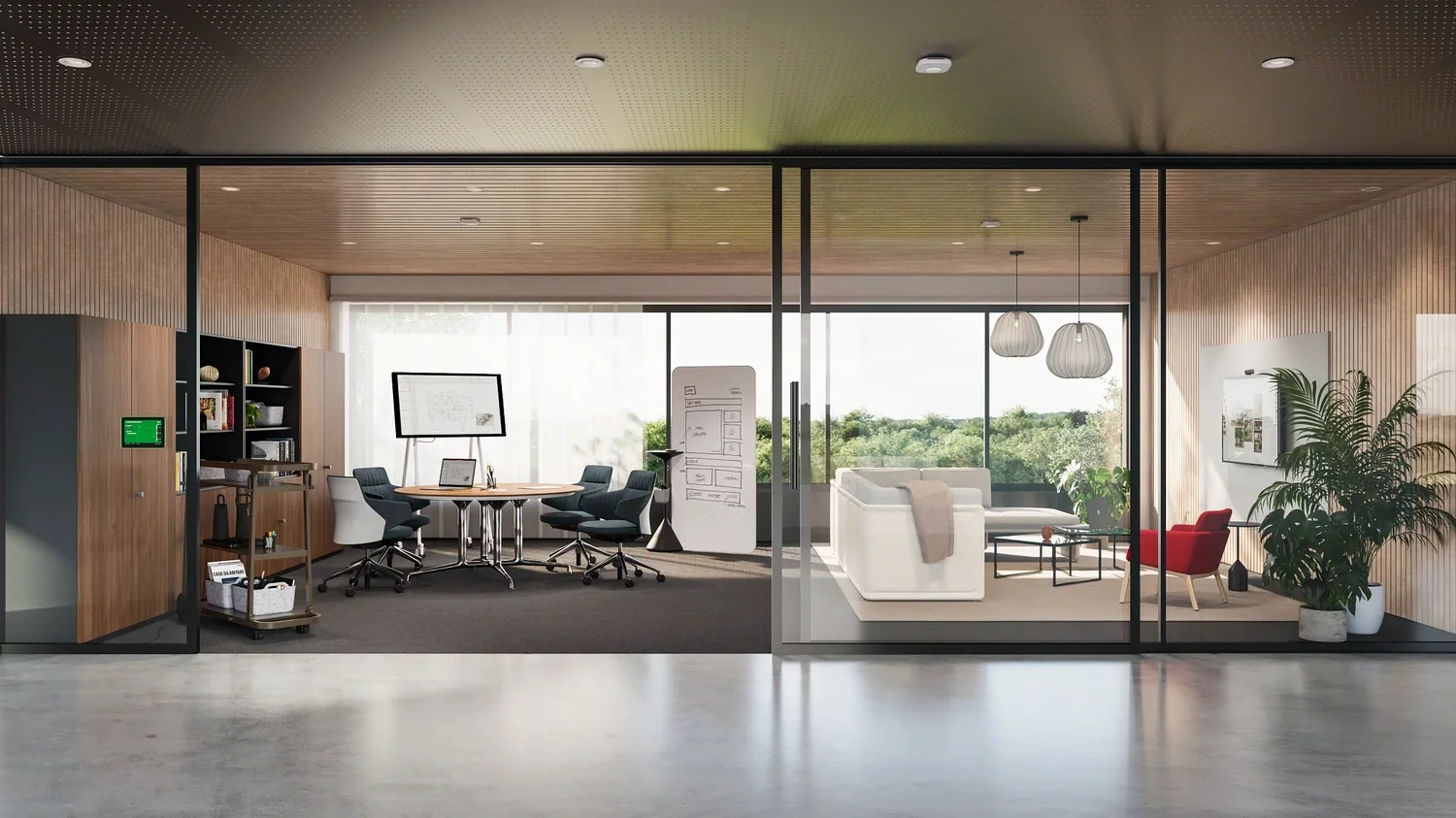 Modern office space with glass walls, featuring a meeting area with chairs, a round table, whiteboard, and a lounge area with white sofas, a red chair, plants, and pendant lights.