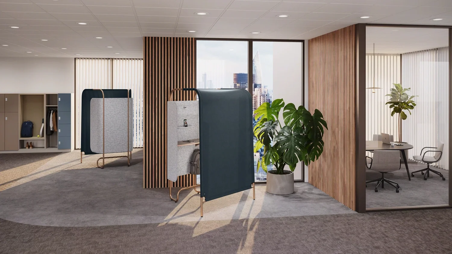 Modern office interior with two private work pods, a large plant, lockers, and a glass-walled meeting room with chairs and a laptop.