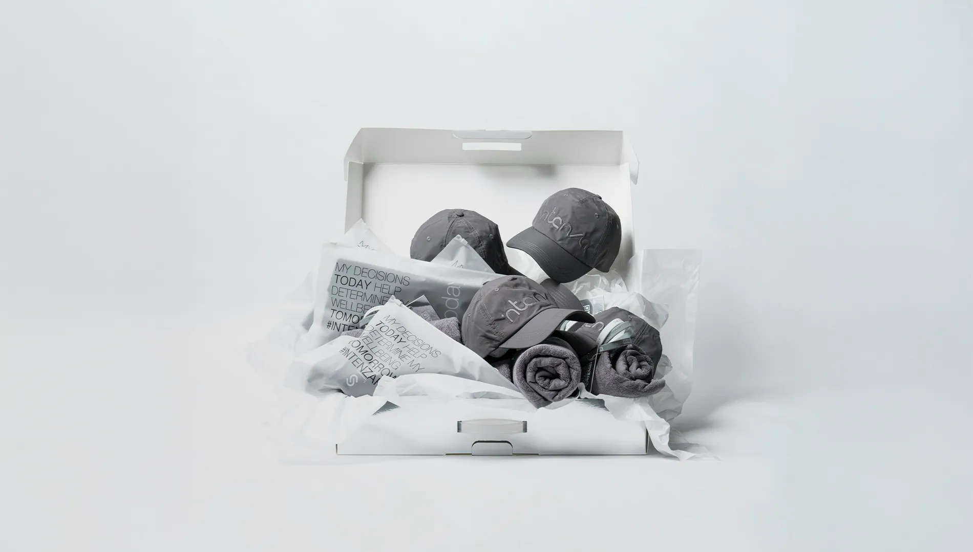 hat inside white packaging with decoration.