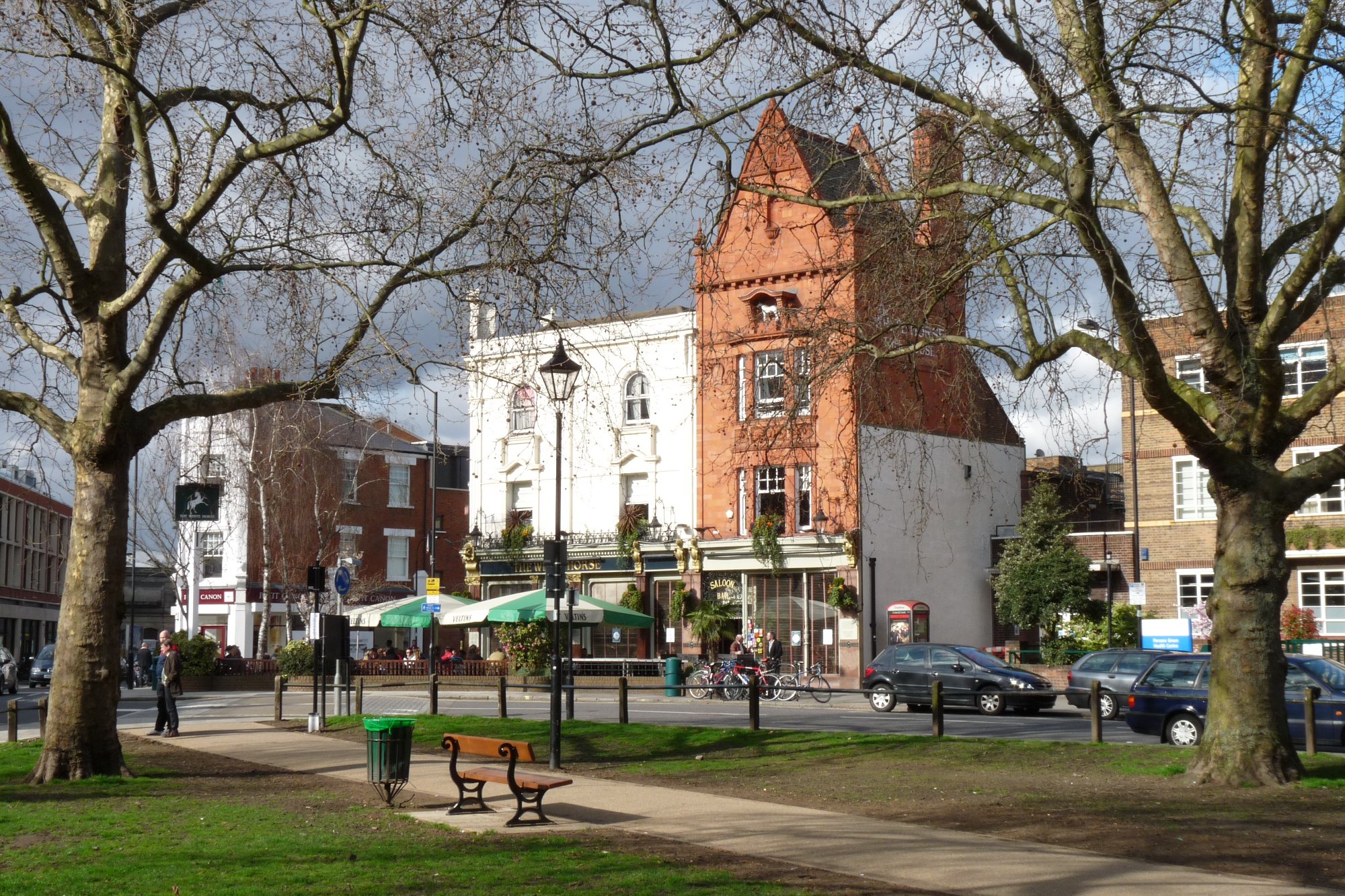 The green at Parsons Green with The White Horse
