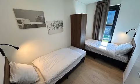 Schlafzimmer 2 im Cube Exclusif 14 mit zwei Einzelbetten