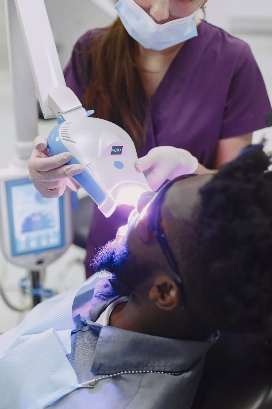 Whitening light applied to a patient's teeth during in-office whitening